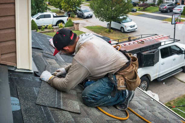 Professional Roofing technician working in Blair, WI